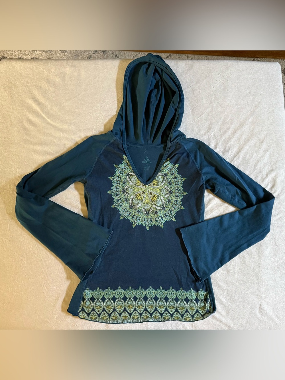 Prana Women's Teal Hooded V-Neck Top with Decorative Mandala and Hem Print